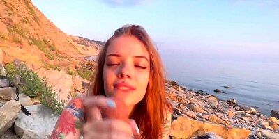 Took her dick in her mouth right on the beach